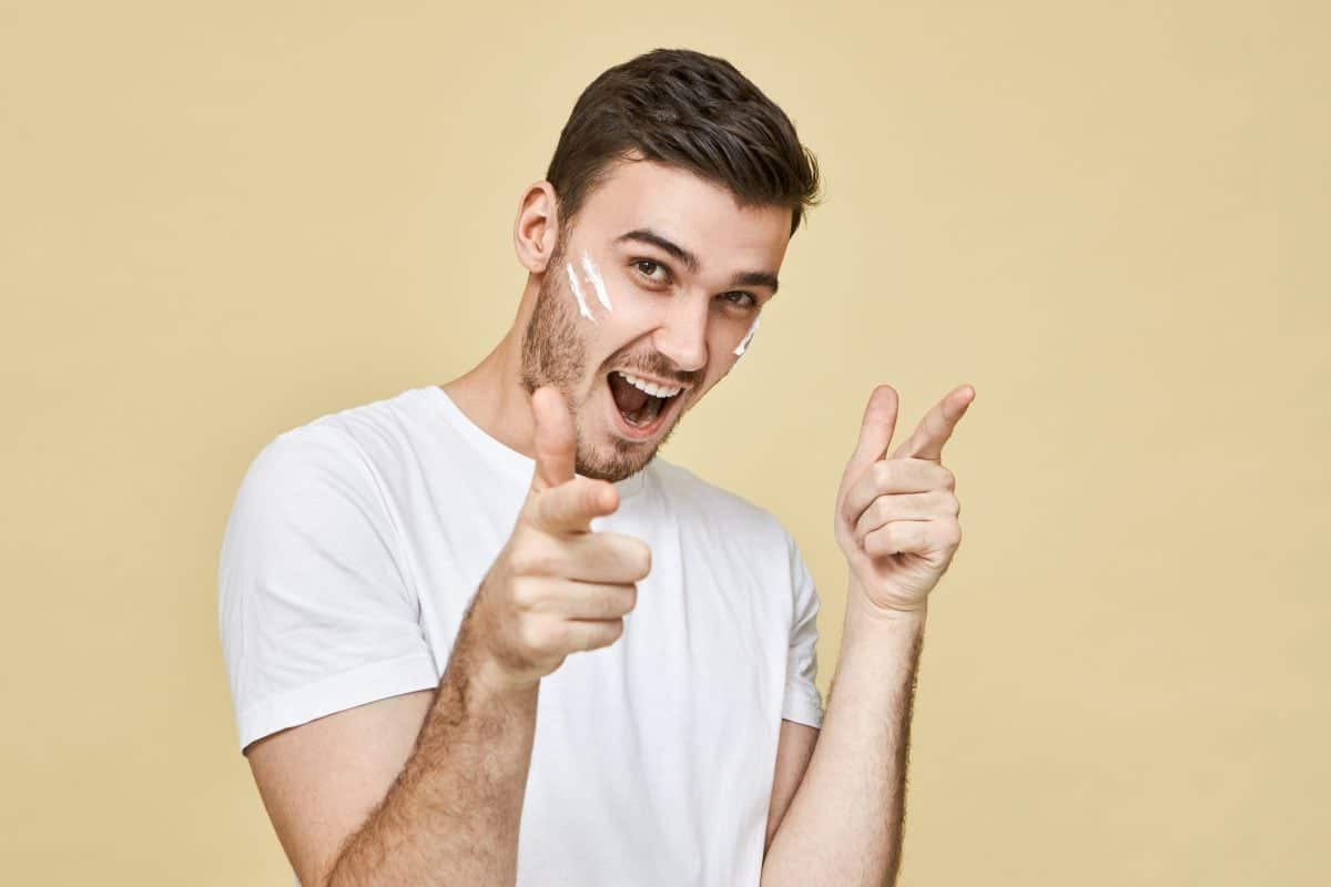 positive human facial expressions emotions body language portrait handsome overjoyed young unshaven male with foam his cheeks exclaiming excitedly pointing fore fingers 16770819233x2 iIycMu