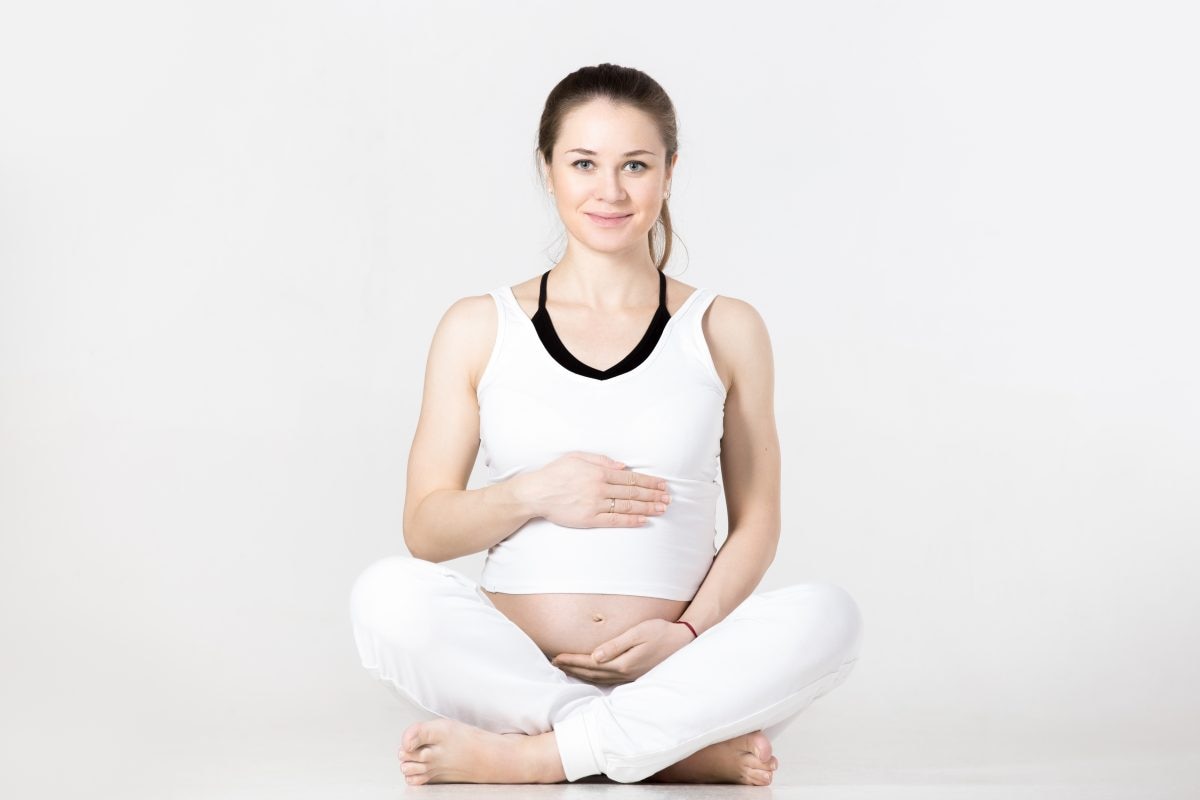 pregnant woman sitting floor 16766078633x2 MnVTrT