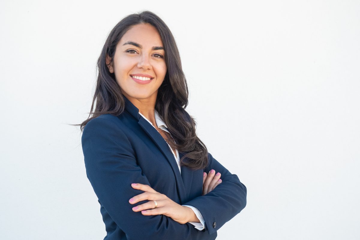 smiling confident businesswoman posing with arms folded 16756162643x2 NMFU1v
