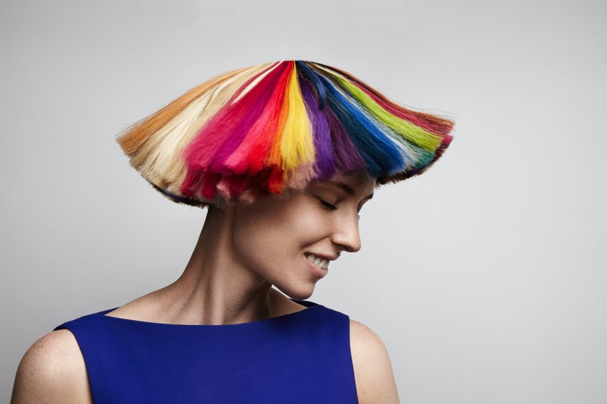 woman shake her rainbow color hair 16775771393x2 3fae1r